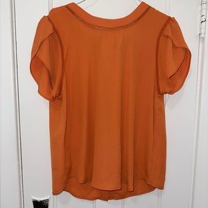 Iris, large, burnt orange.